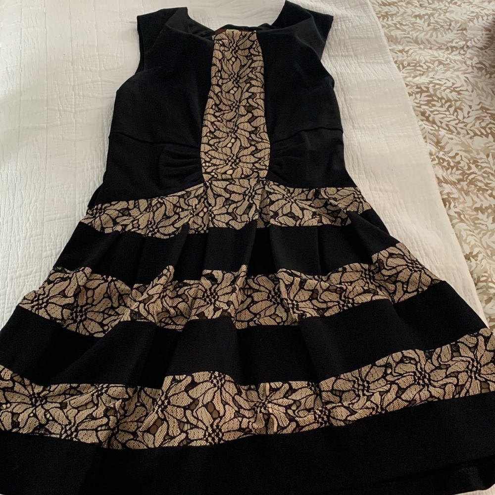 Black and cream lace mini dress. Eva Franco from Anthropologie